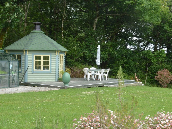 Summer house with outside garden seating