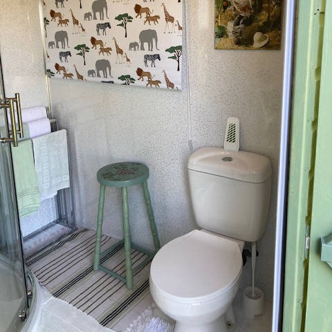 Bathroom with animal artwork